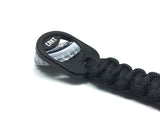 Crkt Paracord EDC Keychain Bottle Opener Black lifting a cap